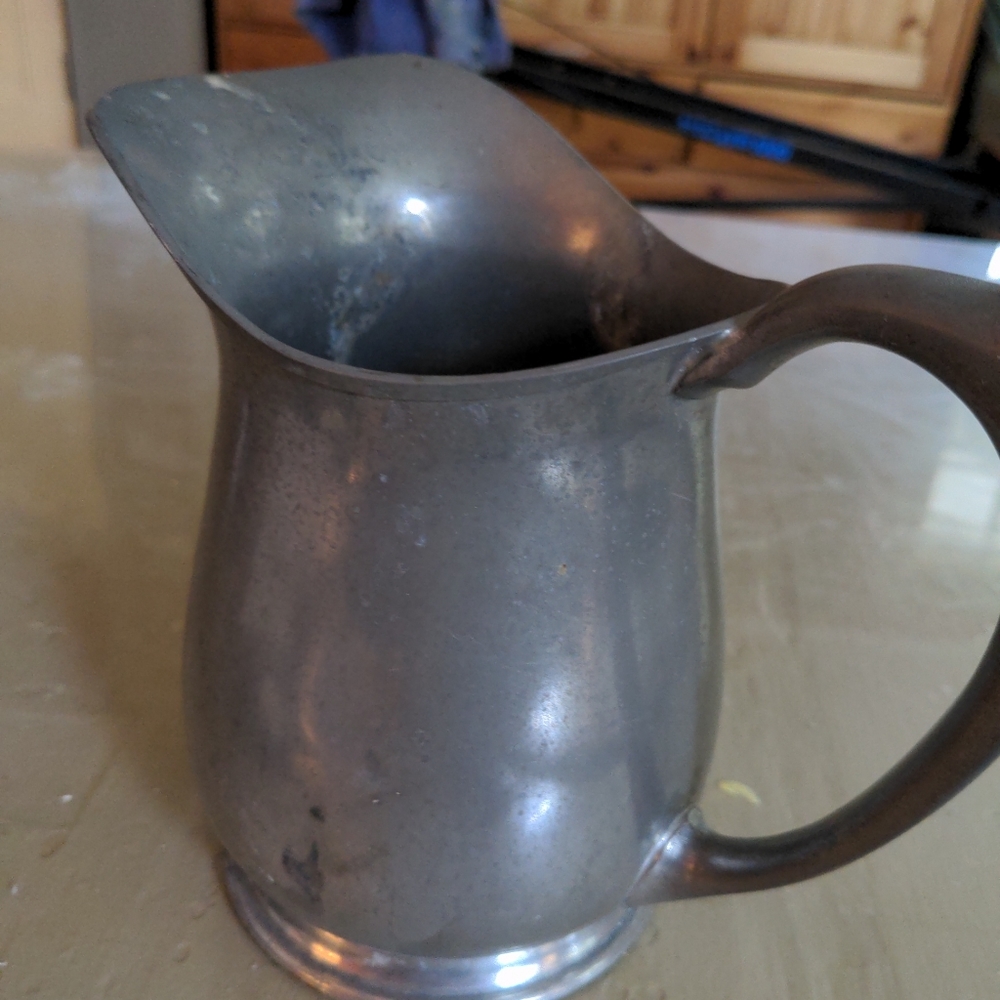 Antique pewter water pitcher